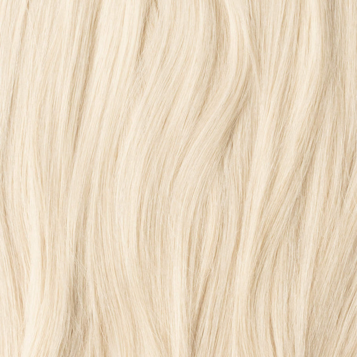 Włosy clip-in blond 60B, naturalne. Łatwe mocowanie. Długie, gęste przedłużenia włosów do stylizacji i fryzur.