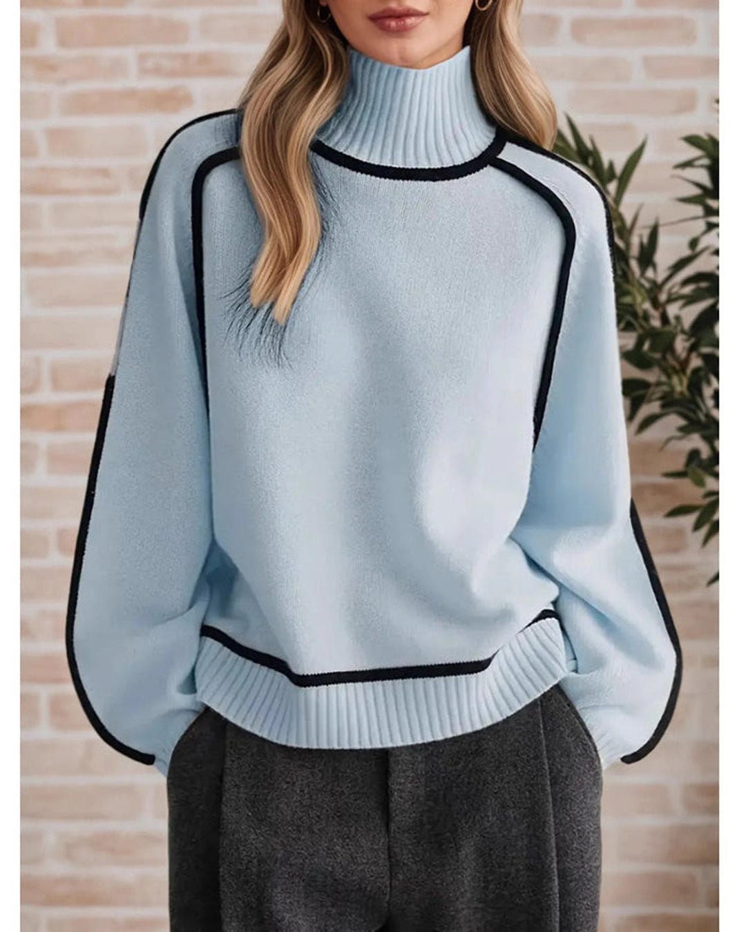 Uniwersalny dzianinowy sweter damski oversize z golfem, idealny do wielu casualowych stylizacji, jesień/zima.