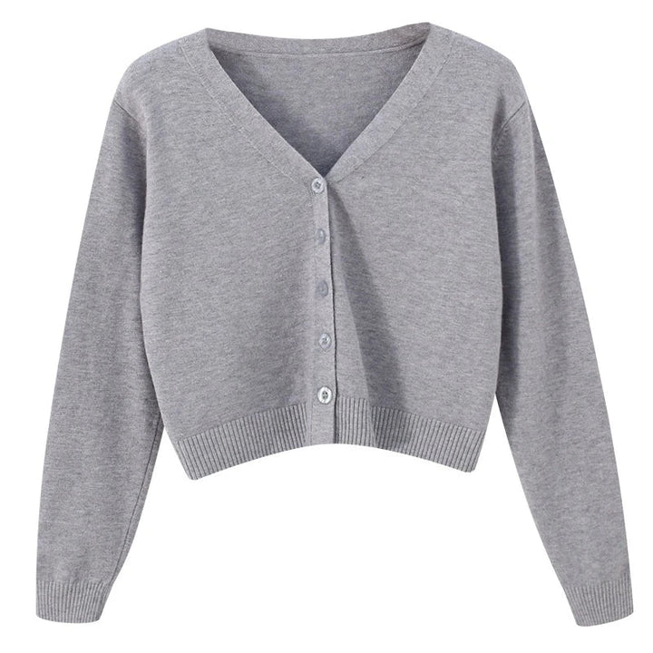 Jesienny casualowy krótki sweter damski V-neck. Luźny fason, idealny na warstwy, uniwersalny rozmiar.
