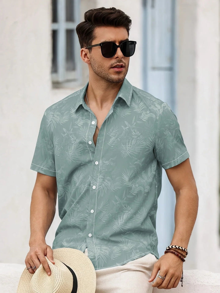 Zielona męska koszula slim fit z tropikalnym wzorem. Casualowa, letnia, na plażę. Krótki rękaw.