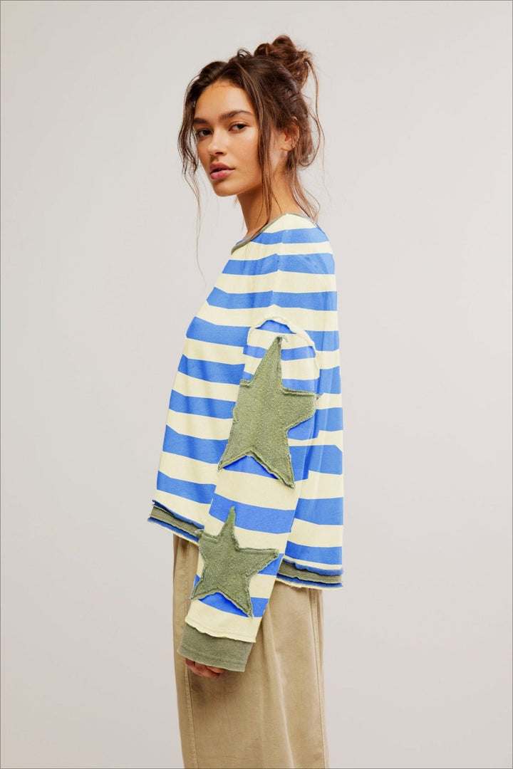 Komfortowa bluza damska oversize z modną gwiazdą. Doskonała do casualowych stylizacji na co dzień.