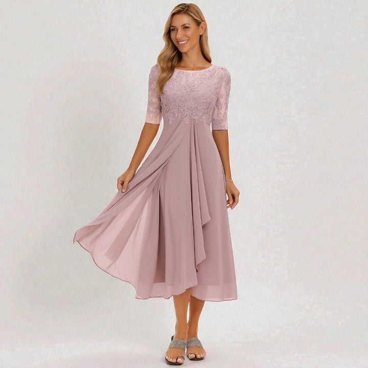 Modna sukienka midi damska, idealna na lato i wiosnę. Prosty krój z podkreśloną talią, elegancka.