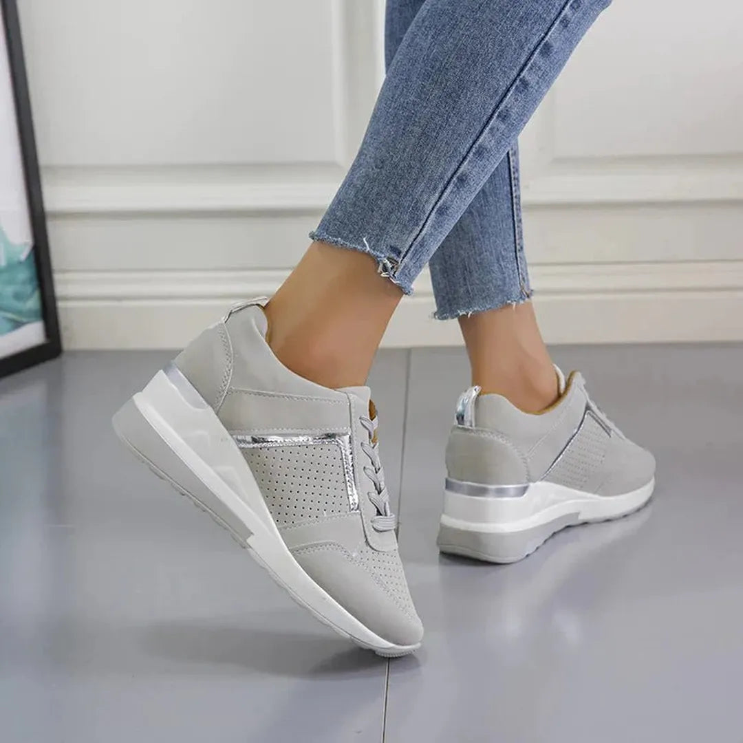 Damskie sneakersy perforowane na stopie, komfortowe i stylowe obuwie codzienne. Wiosenny must-have.