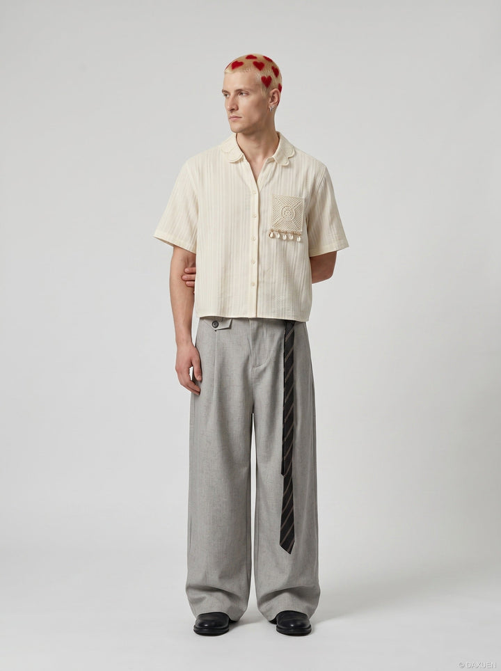 Kremowa koszula damska haftowana z muszelkami, idealna na lato i wakacje. Krótki rękaw, styl boho.
