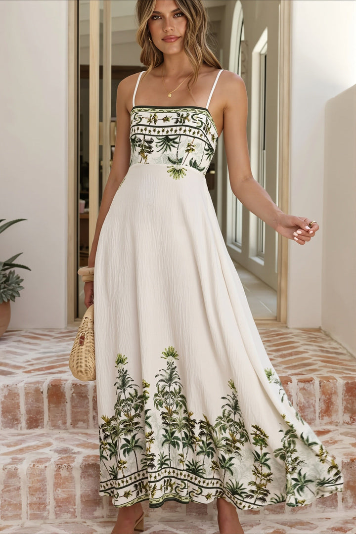 Damska sukienka maxi typu slip dress z kwiatowym printem boho, bez rękawów, poliester, na upały.