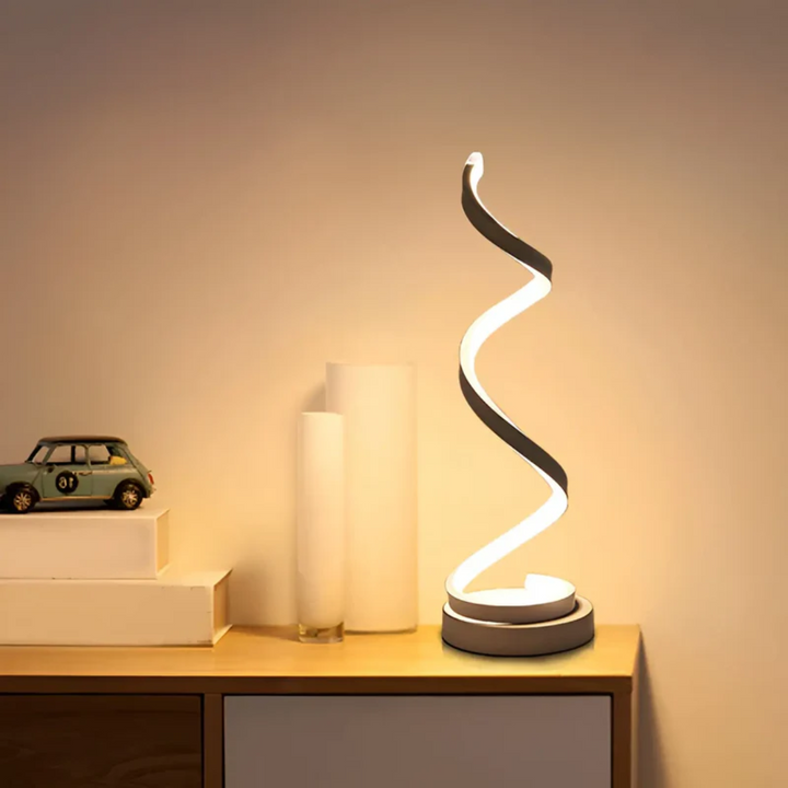 Nowoczesna lampa stołowa LED LumaSpiral, dimmowalna, idealna do salonu.
