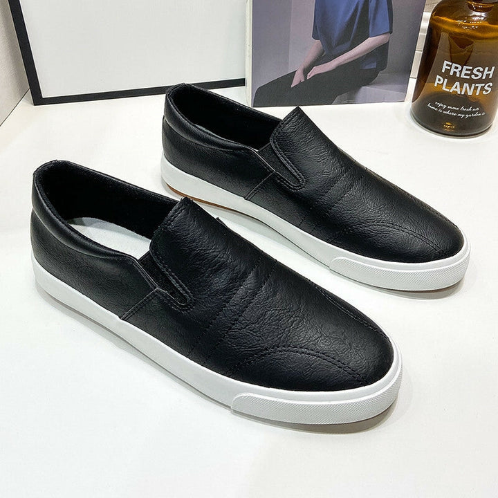 Modne męskie sneakersy slip-on Jonas. Skórzane buty wsuwane, idealne do miejskiego casualowego stylu.