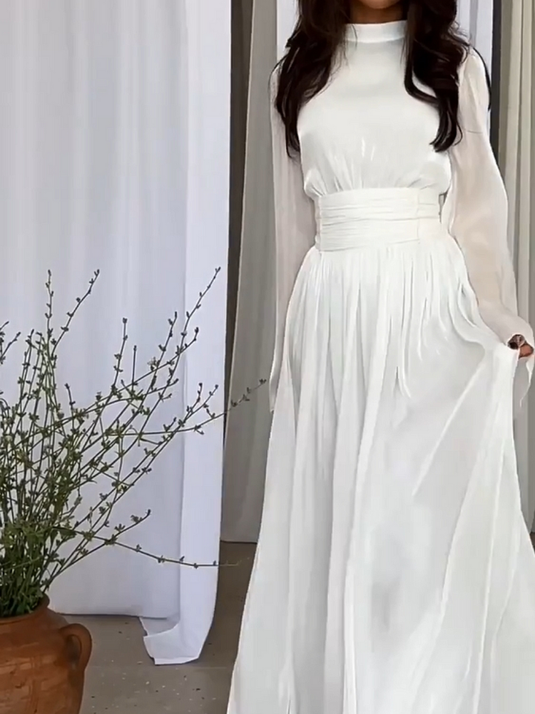Modna sukienka maxi z płynnym krojem. Swobodna i elegancka, perfekcyjna na letnie dni.