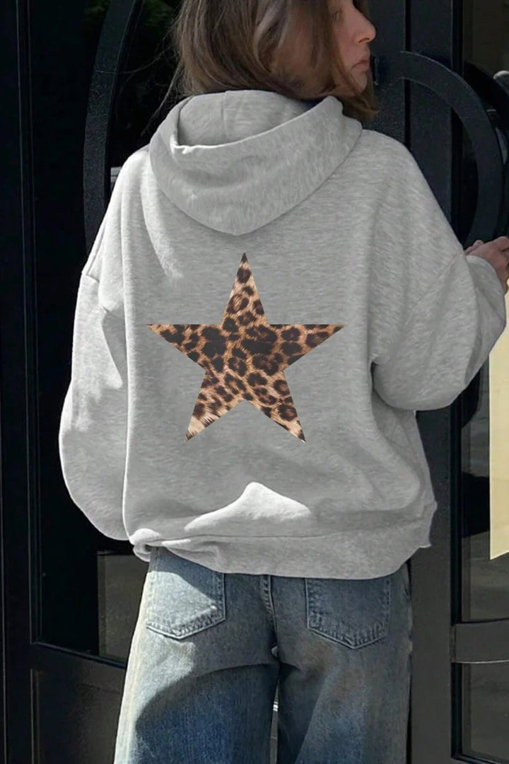 Damska bluza z kapturem w gwiazdy, wygodna, casualowa. Modny element jesienno-zimowej garderoby.