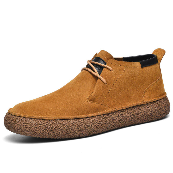 Męskie botki chukka w klasycznym stylu, idealne do casualowych i eleganckich jesiennych stylizacji.