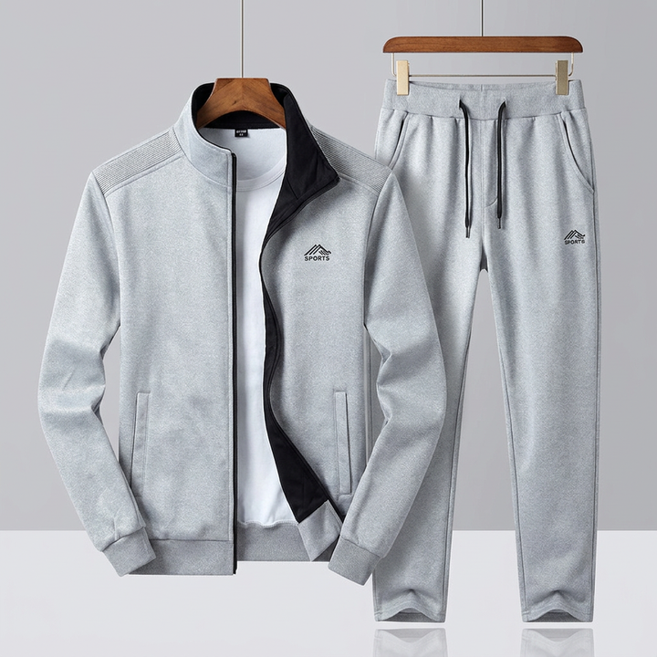 Męski dres sportowy z bluzą i spodniami z miękkiej dzianiny. Idealny na trening, jogging oraz jako strój casual.