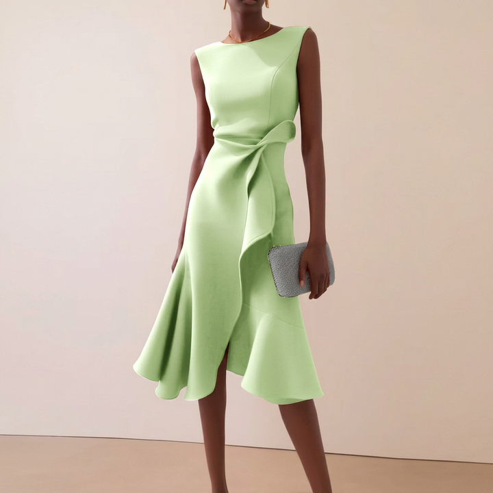 Lekka sukienka damska midi bez rękawów, z kokardą i okrągłym dekoltem. Idealna na upalne letnie dni.