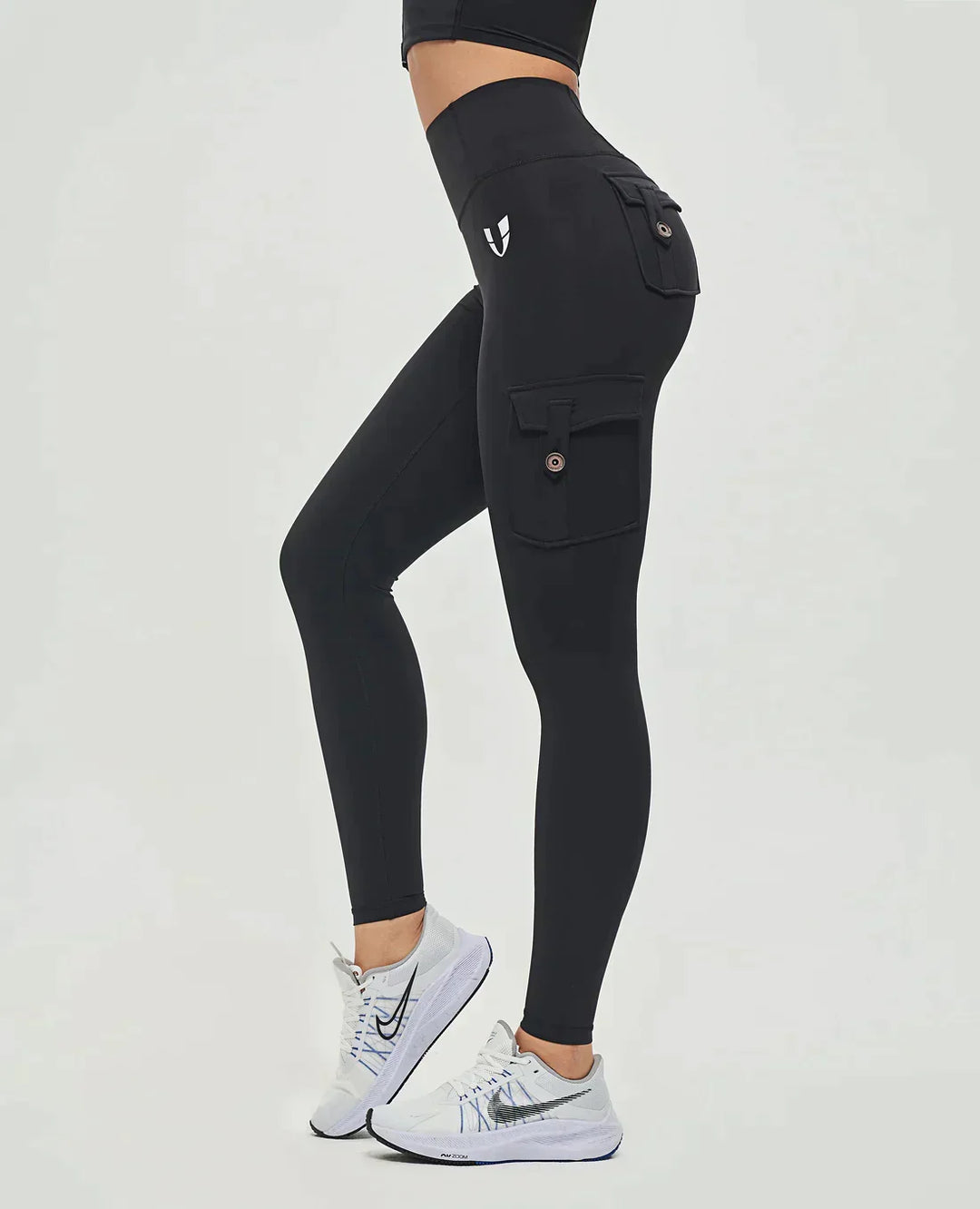 Damskie legginsy cargo z wysokim stanem, idealne na wiosnę, łączące styl casual z wygodą.
