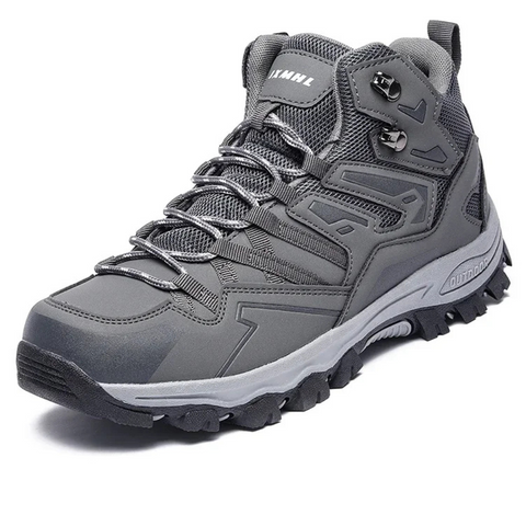 Praktyczne buty trekkingowe unisex, idealne do wędrówek po górach i wymagającym terenie.
