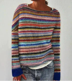 Stylowy damski sweter, luźny krój. Idealny do casualowych outfitów. Zapewnia komfort przez cały dzień.