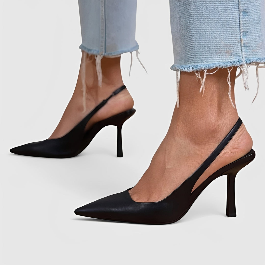 Eleganckie damskie szpilki w kolorze czarnym. Modne buty z ostrym noskiem, idealne na specjalne okazje.