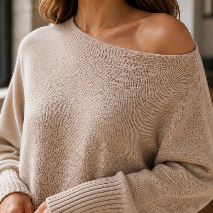 Elegancki sweter damski asymetryczny z długim rękawem i odkrytym ramieniem.