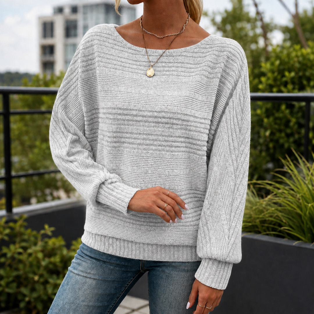 Uniwersalny sweter damski prążkowany, luźny fason. Idealny do garderoby na co dzień, styl casual, jesień.