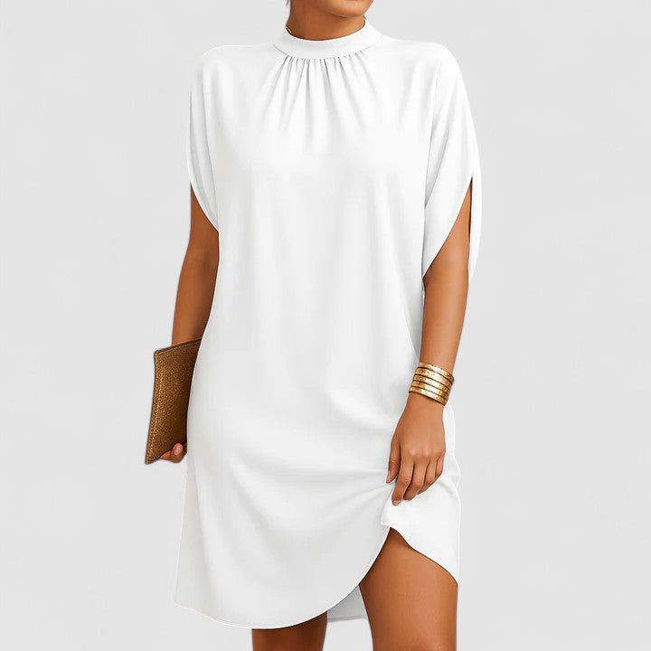 Elegancka damska sukienka oversize midi z marszczeniem, zwiewny fason letni dla wygody i stylu.
