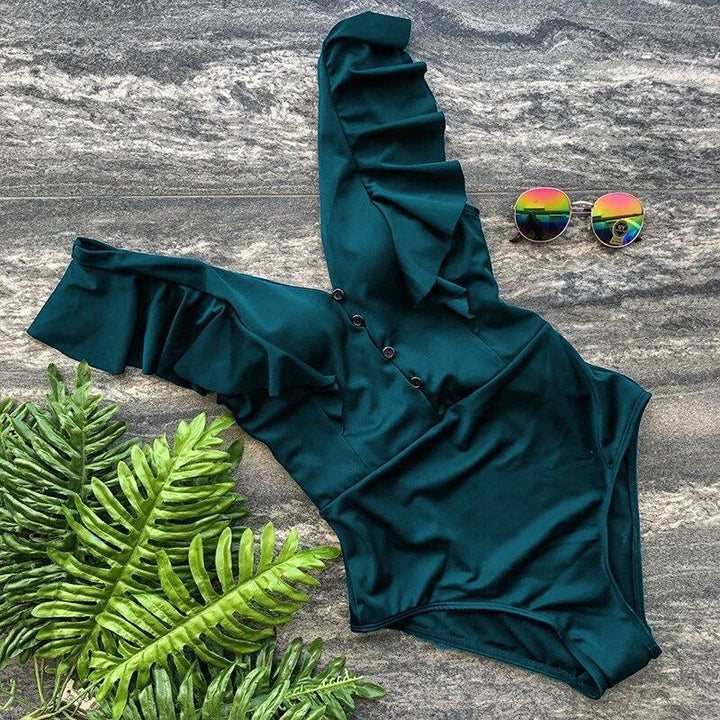 Damski, elegancki strój kąpielowy jednoczęściowy z falbaną. Klasyczny fason na plażę, basen, wakacje. Moda lato.