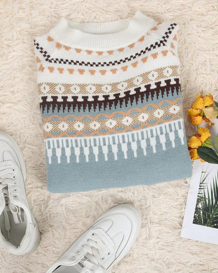 Damski sweter Fair Isle dostępny w niebieskim, szarym i różowym. Komfortowy, modny na zimę i jesień.