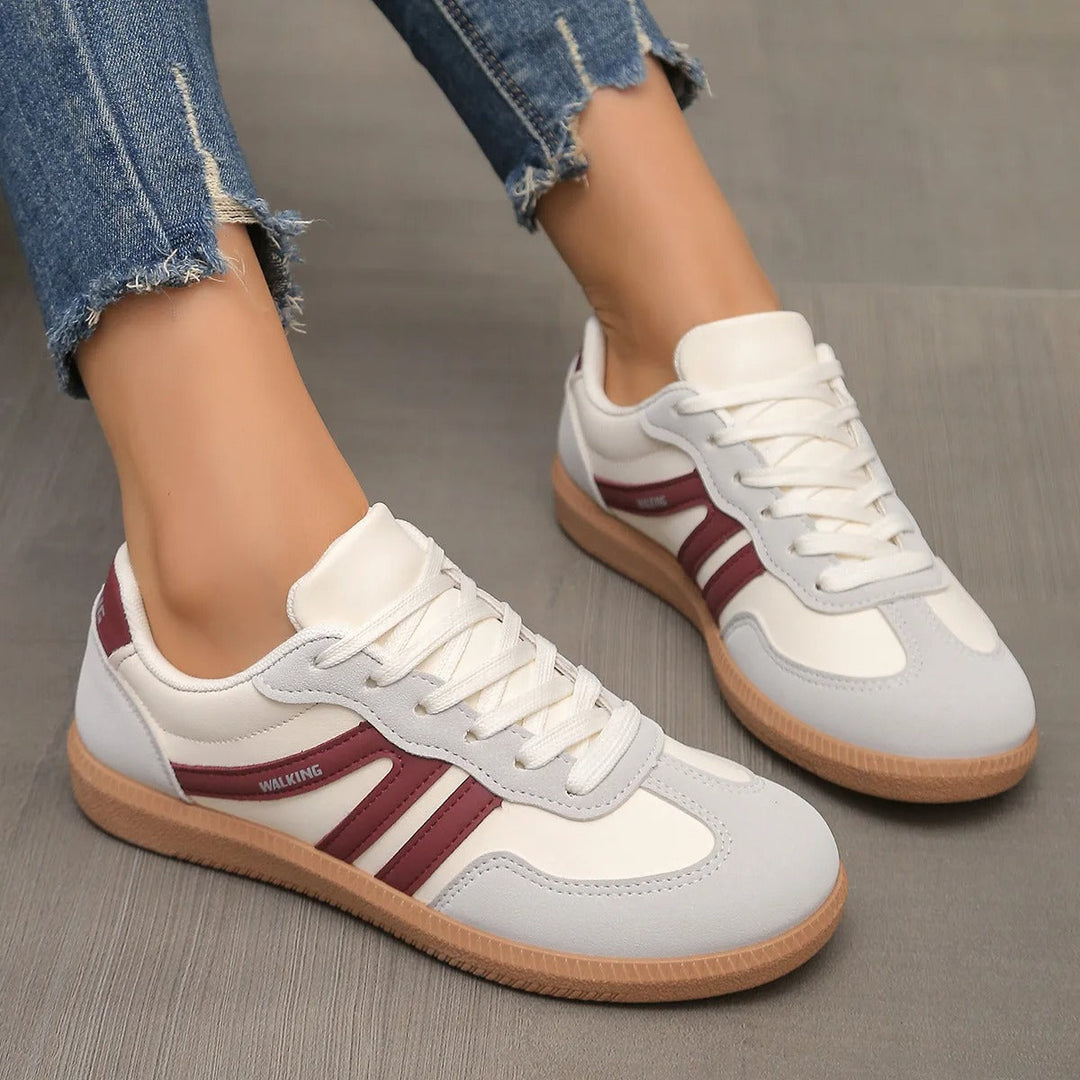 Sportowe damskie sneakersy sznurowane, doskonałe na aktywny dzień. Stylowe obuwie miejskie.