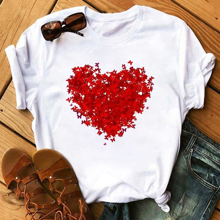 Wygodna letnia koszulka T-shirt damska z kolorowym nadrukiem wzorów. Idealna na upały, luźny krój, styl casual.