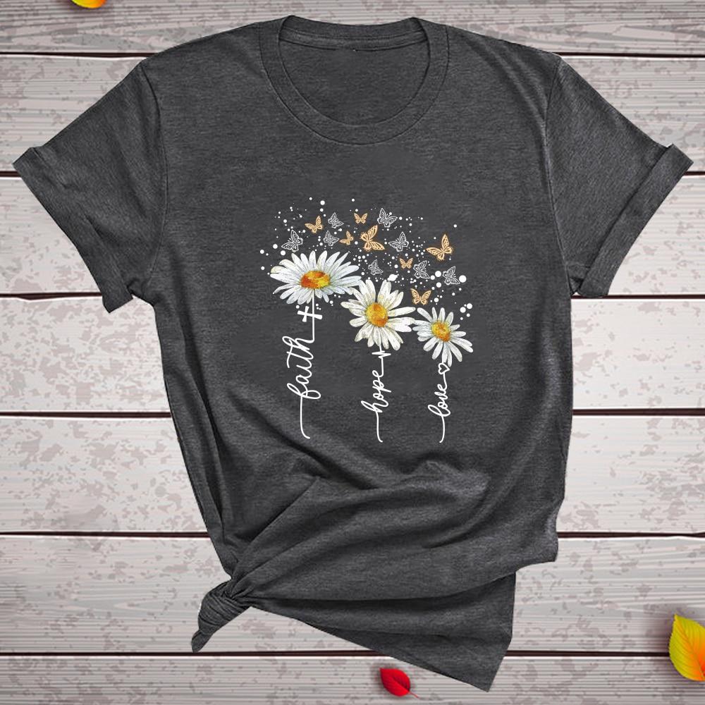 Piękna damska koszulka T-shirt z uroczym kwiatowym nadrukiem, dodająca stylu każdej stylizacji.