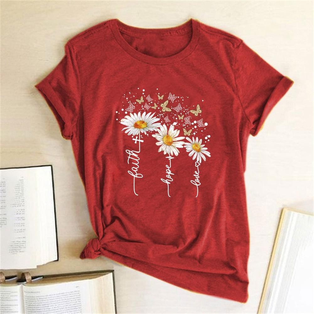 Biała damska koszulka T-shirt z delikatnym, kwiecistym wzorem, idealna na co dzień.