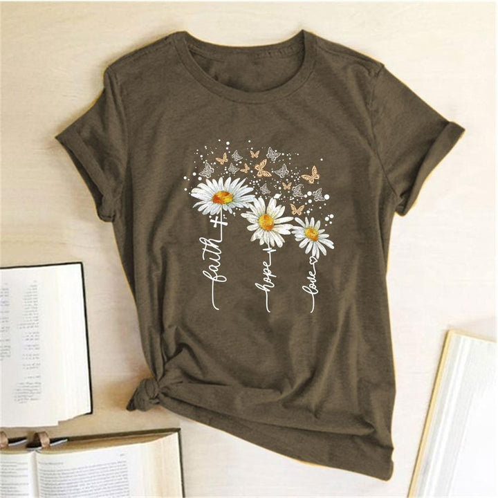 Elegancka damska koszulka T-shirt z artystycznym kwiatowym nadrukiem, modna na lato.