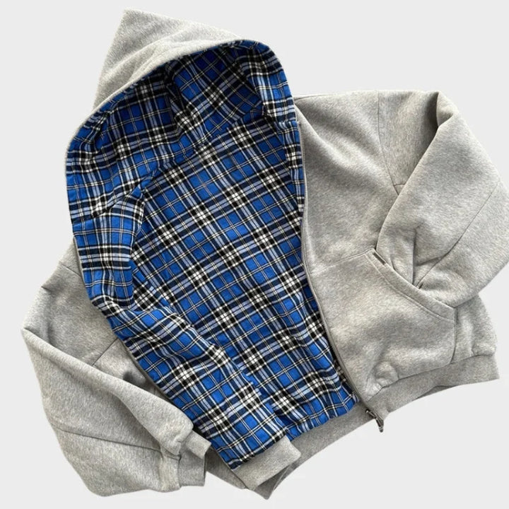 Komfortowa męska bluza oversize z kapturem. Dwustronna, modny element streetwear, idealna do noszenia na co dzień.