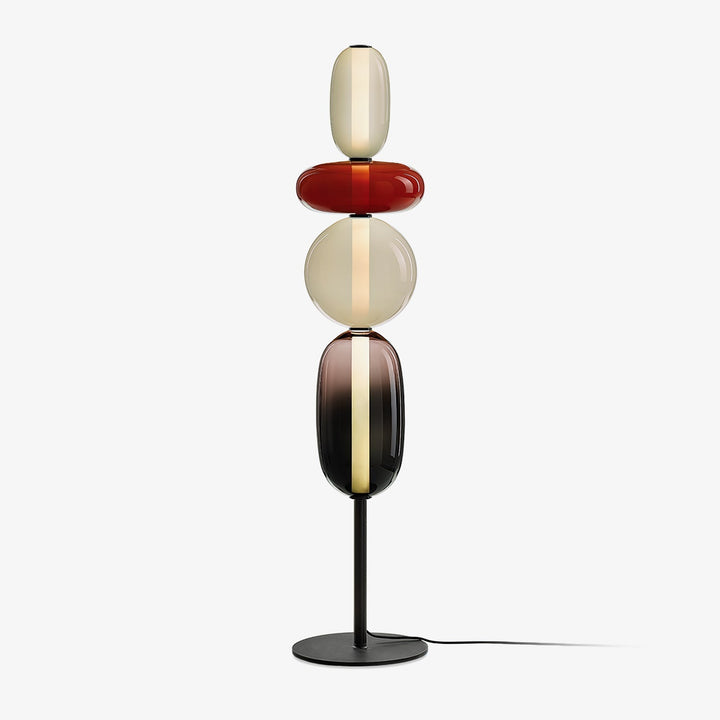 Lampa podłogowa Art Deco z kloszami-kamieniami, oświetlenie LED, do nowoczesnych i eleganckich wnętrz.