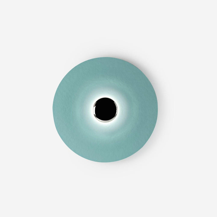 Okrągła lampa ścienna LED, minimalistyczna, nowoczesny design do salonu.