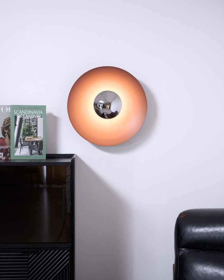 Lampa ścienna LED, okrągła, minimalistyczna, do nowoczesnych wnętrz.