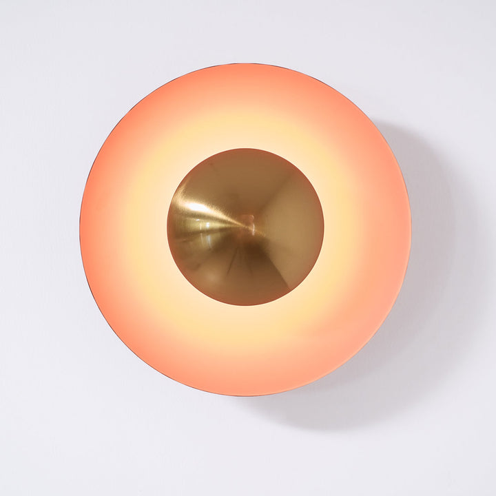 Minimalistyczna lampa ścienna LED, okrągła, do nowoczesnego korytarza.