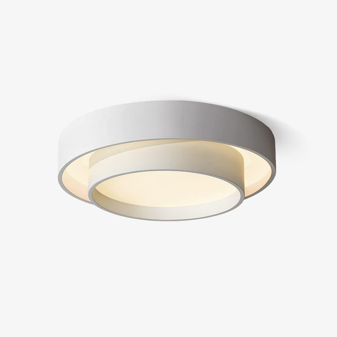 Minimalistyczna lampa sufitowa LED z podwójnym pierścieniem i pilotem do salonu.
