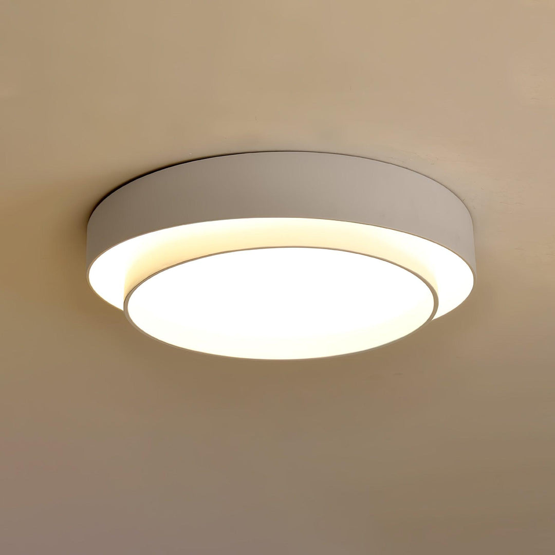 Lampa sufitowa LED ściemnialna, minimalistyczny design, z podwójnym pierścieniem i pilotem.