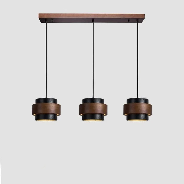 Lampa wisząca Japandi. Kamienny klosz, drewniane detale. Cylindryczne oświetlenie do nowoczesnych przestrzeni.