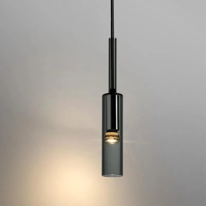 Nowoczesna lampa wisząca, cylindryczny klosz ze szkła dymionego E27. Eleganckie oświetlenie do sypialni.