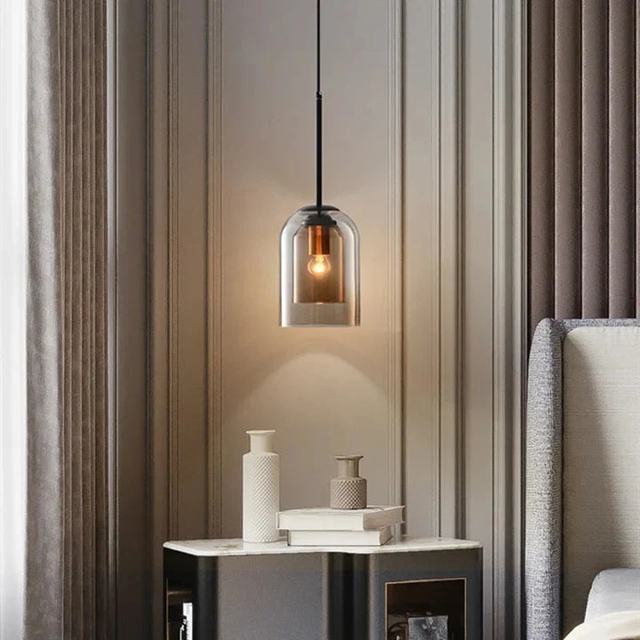 Designerska lampa wisząca brązowa z dymionym szarym kloszem E27. Oświetlenie do sypialni.