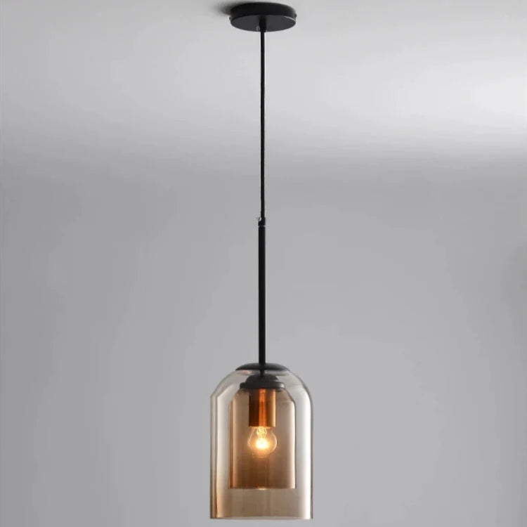 Lampa wisząca brązowo-szara, skandynawska, z podwójnym kloszem szklanym. Nowoczesne wnętrza.