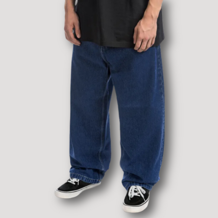 Męskie spodnie baggy jeans w stylu skate, szerokie nogawki, must-have do streetwearu.