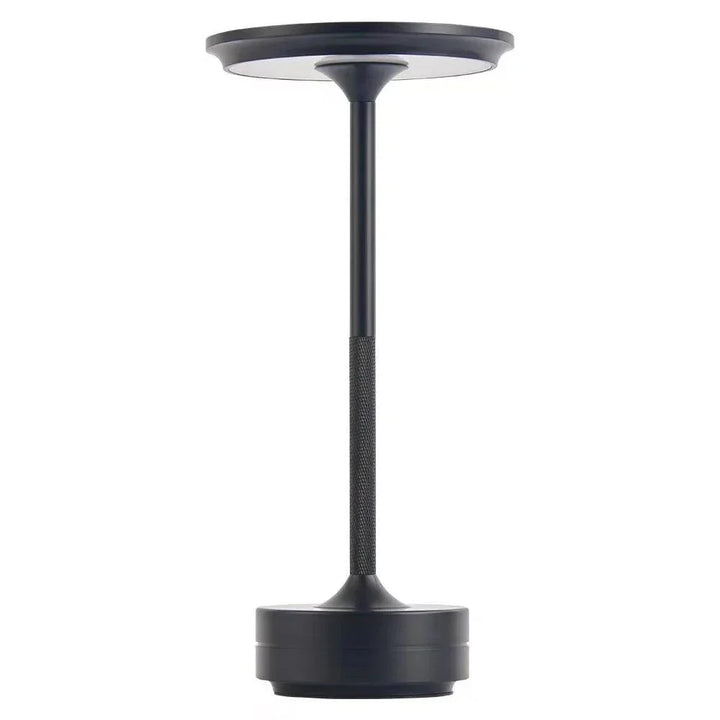 Elegancka lampa stołowa z aluminium, z wbudowaną funkcją bezprzewodowego ładowania.