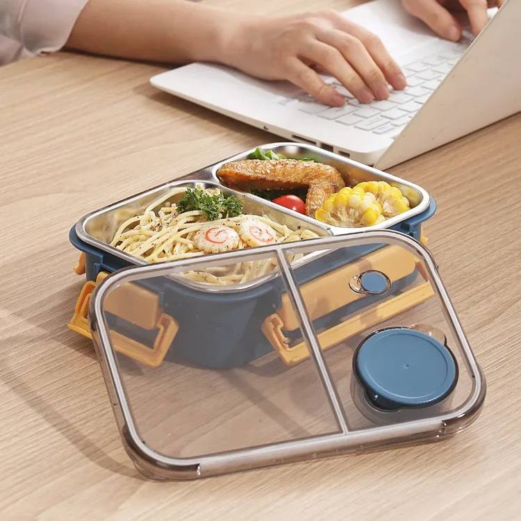 Kompaktowy lunchbox termiczny z 3 komorami, idealny do plecaka, na przechowywanie żywności.