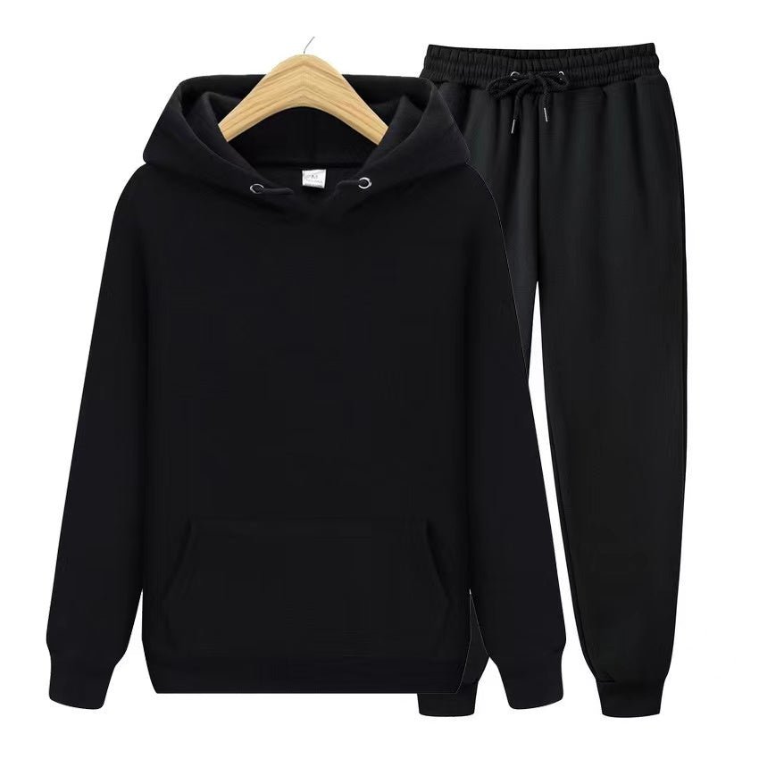 Stylowy męski komplet dresowy: bluza z kapturem i spodnie. Odzież casual i sportowa.