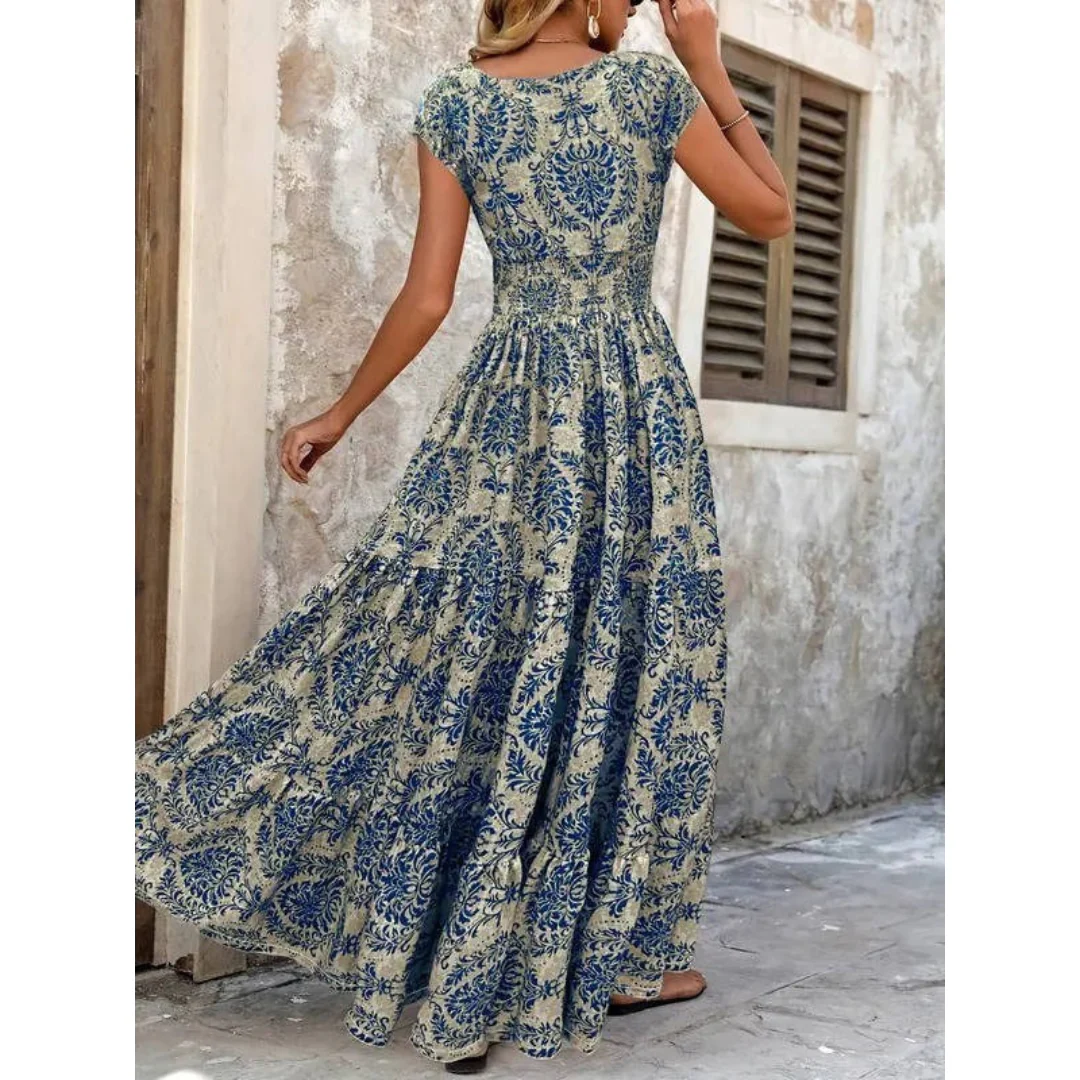Elegancka damska sukienka letnia maxi boho, długa i zwiewna. Wygodna propozycja na ciepłe dni i plażę.