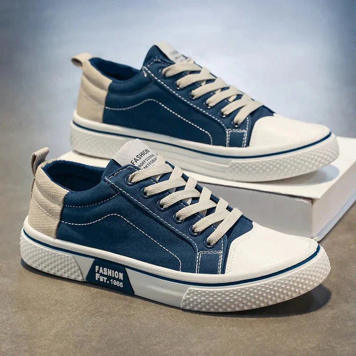 Czarne męskie sneakersy casual sznurowane, idealne na co dzień. Klasyczne buty z niską cholewką.