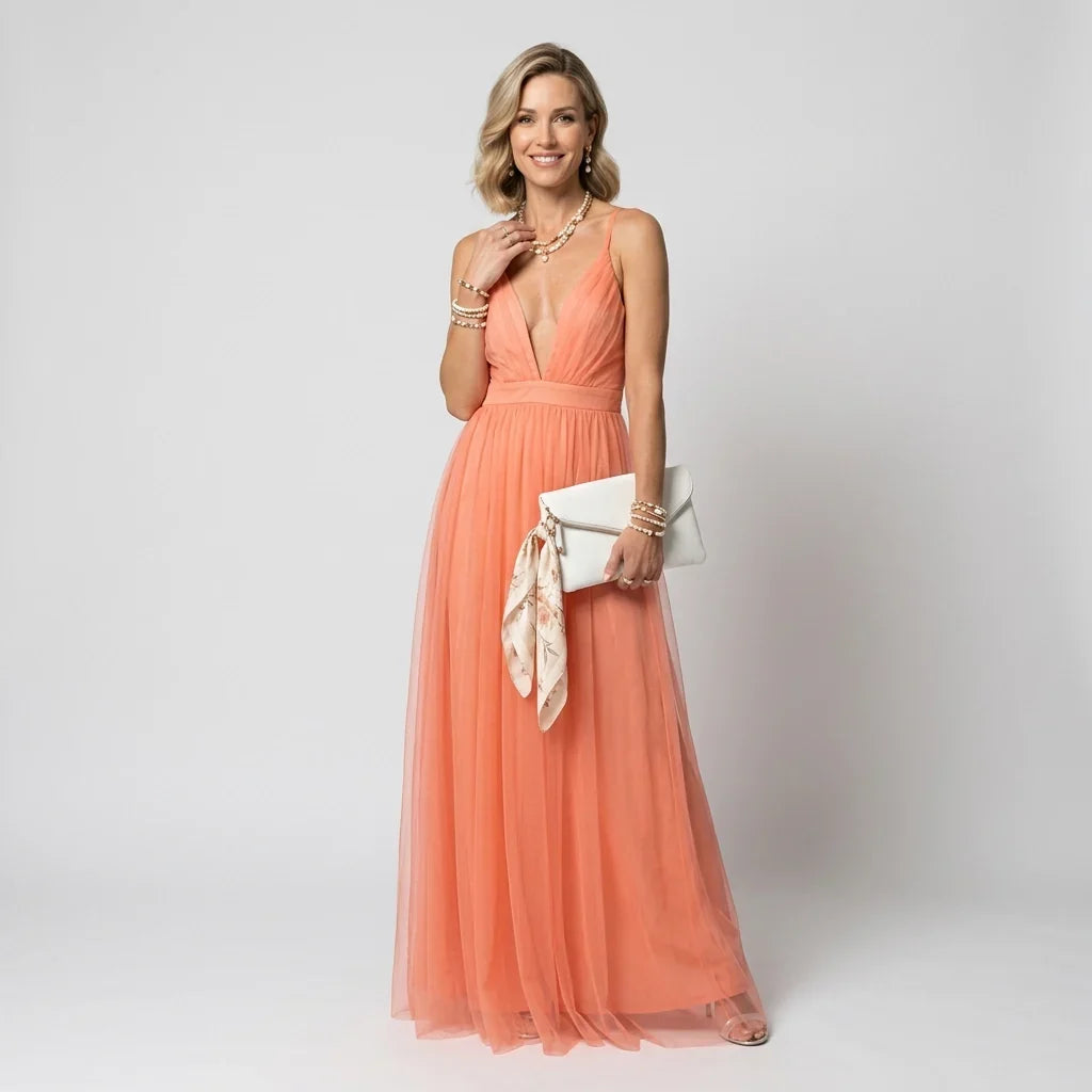 Pomarańczowa sukienka maxi wieczorowa, elegancki krój A, idealna na wesele lub galę. Moda damska, szykowna.