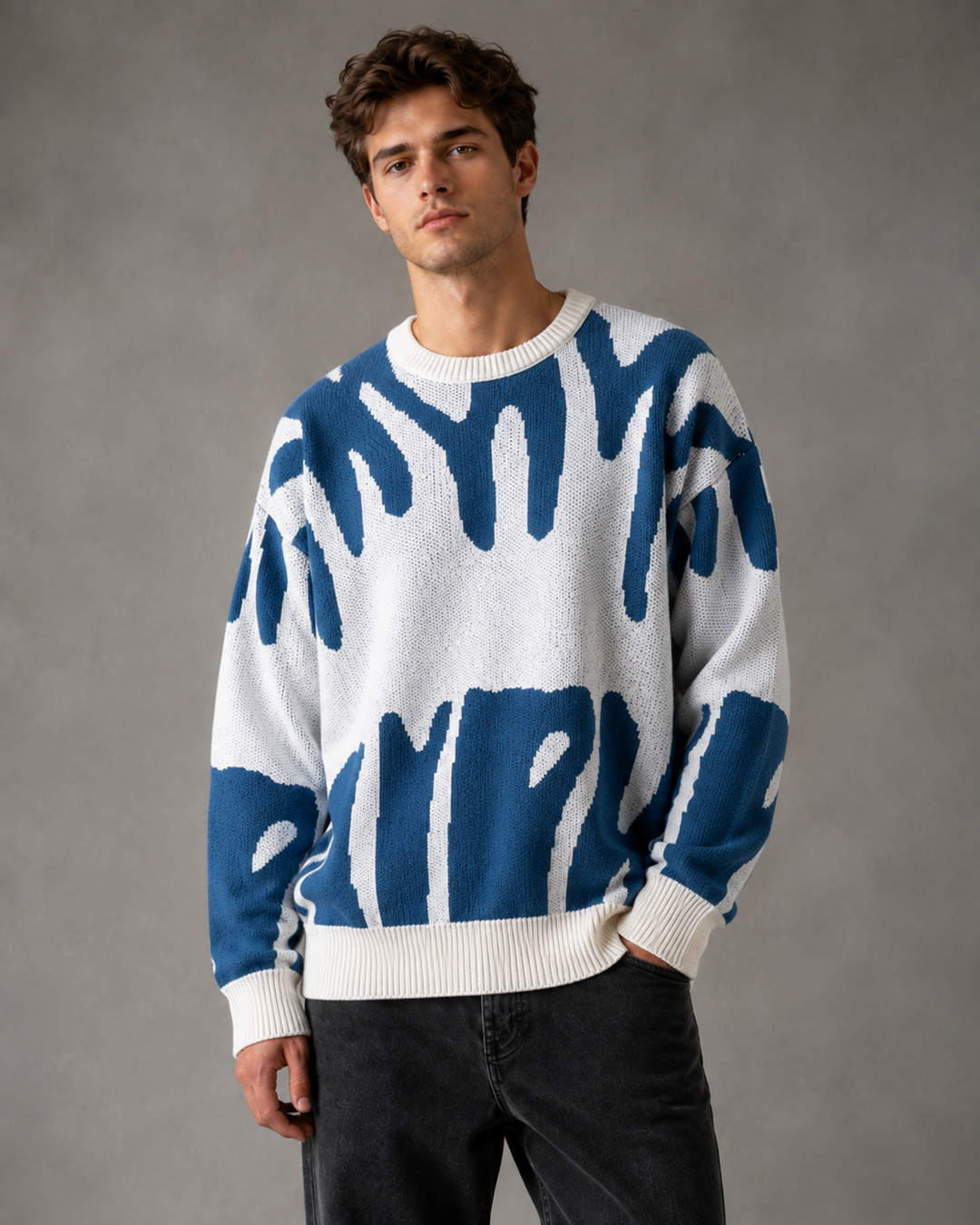 Abstrakcyjny sweter męski, luźny krój, odzież męska na jesień, do stylizacji casualowych.