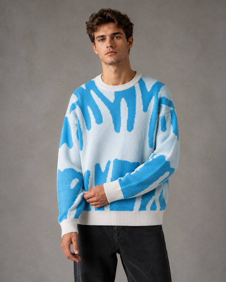 Sweter męski casual z abstrakcyjnym wzorem, idealny do stylizacji warstwowych, luźny krój.